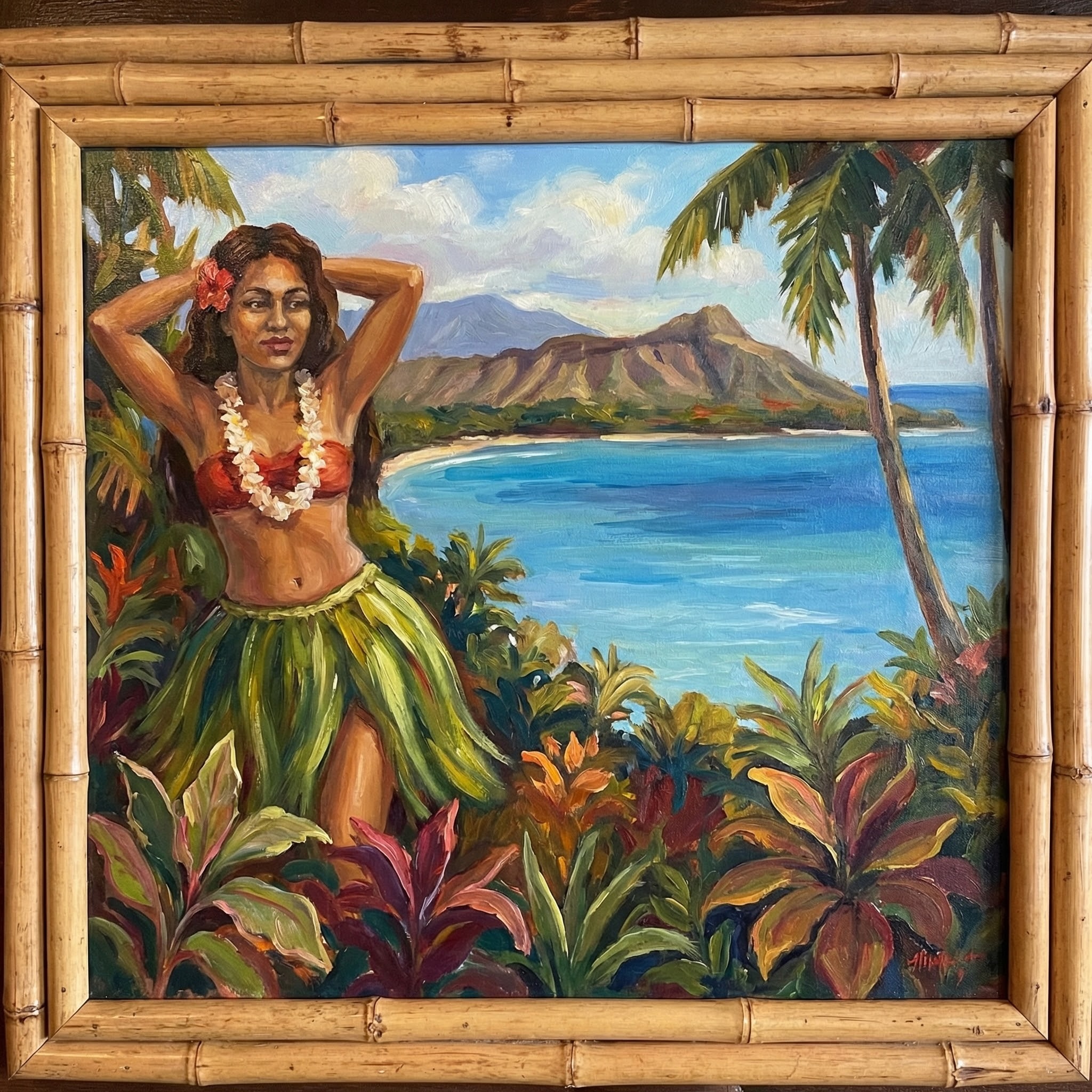 A framed oil painting of a Hawaiian hula dancer in lei and grass skirt with a Diamond Head-style coastline background, palm trees flanking, framed in real bamboo poles cut and lashed — one of the original wall murals from the Bamboo Room at Highland Beach