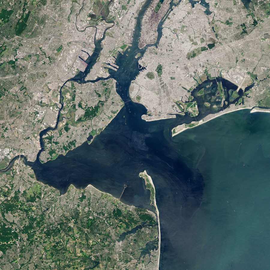 A Landsat satellite view of Sandy Hook and the Navesink Highlands — the peninsula from tip to ridge, the river mouths between
